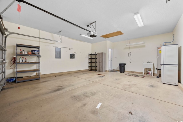 9831 Winchester Ct, Murrells Inlet, SC 29576 - garage featuring electric panel and a garage door opener