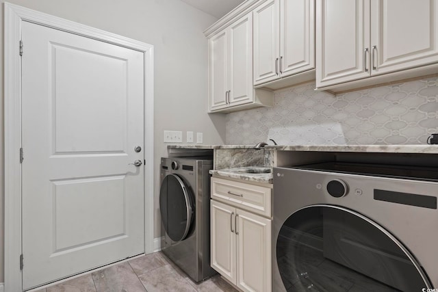 2204 Woodstork Dr, Conway, SC 29526 - clothes washing area with cabinet space and washer and clothes dryer