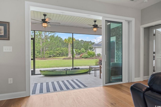 2204 Woodstork Dr, Conway, SC 29526 - doorway to outside with a ceiling fan, wood finished floors, and baseboards