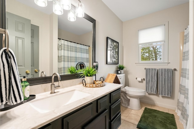 2170 Deerfield Ave, Surfside Beach, SC 29575 - bathroom featuring tile patterned floors, toilet, and vanity