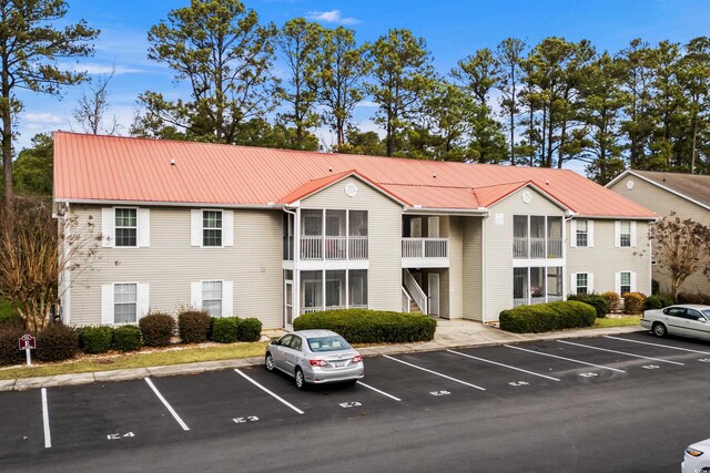 193 Charter Dr Unit E7, Longs, SC 29568 - view of building exterior with uncovered parking