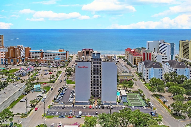 view of urban area with a large body of water