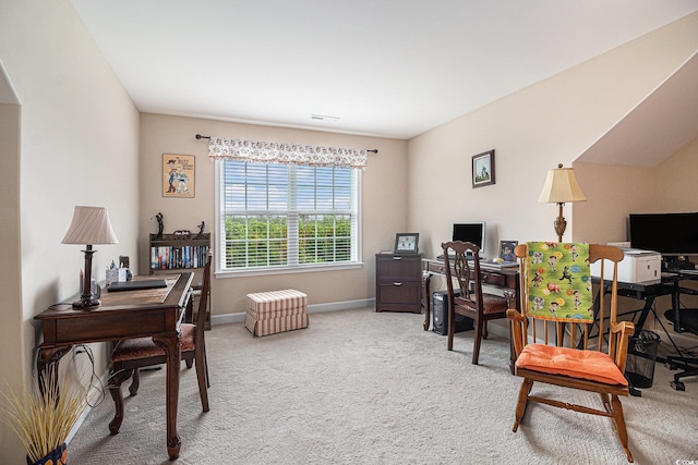carpeted office with baseboards