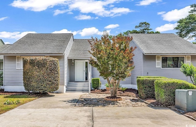 4339 Baldwin Ave Unit 4339, Little River, SC 29566 - view of front facade featuring roof with shingles