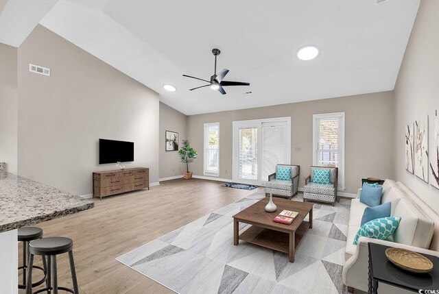 4339 Baldwin Ave Unit 4339, Little River, SC 29566 - living room featuring vaulted ceiling, ceiling fan, baseboards, light wood-style floors, and recessed lighting
