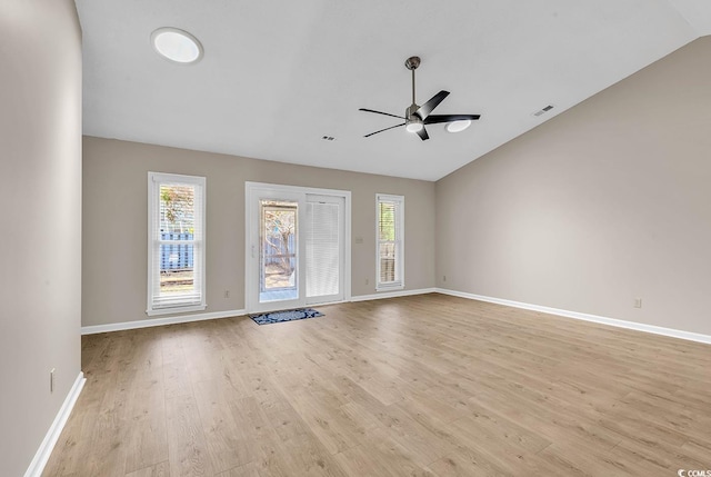 4339 Baldwin Ave Unit 4339, Little River, SC 29566 - spare room with lofted ceiling, a ceiling fan, light wood finished floors, baseboards, and healthy amount of natural light