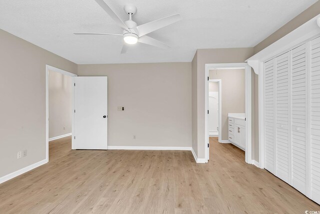 4339 Baldwin Ave Unit 4339, Little River, SC 29566 - unfurnished bedroom with light wood-style flooring, baseboards, a closet, and ceiling fan