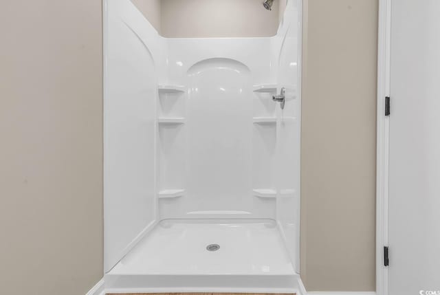 4339 Baldwin Ave Unit 4339, Little River, SC 29566 - bathroom featuring a shower and baseboards