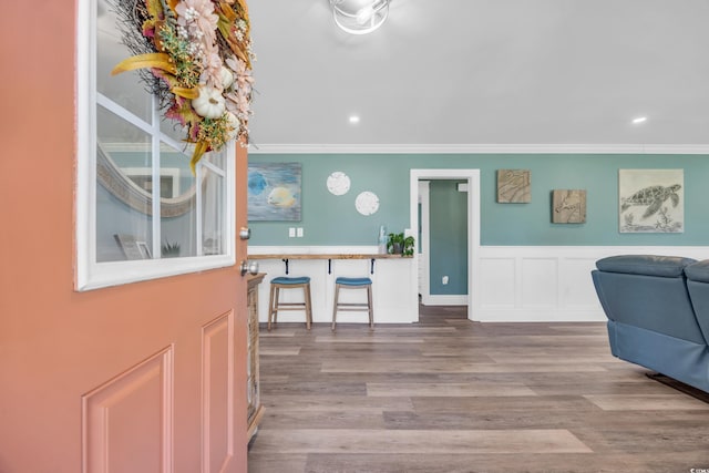 1014 Thomas Ave, North Myrtle Beach, SC 29582 - entryway with ornamental molding, wood finished floors, wainscoting, and recessed lighting