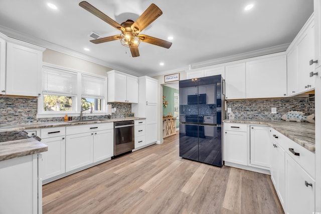 1014 Thomas Ave, North Myrtle Beach, SC 29582 - kitchen featuring dishwasher, crown molding, tasteful backsplash, a ceiling fan, and a sink