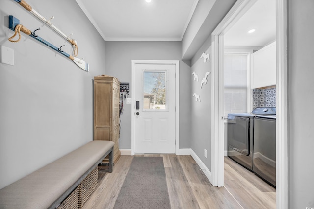 1014 Thomas Ave, North Myrtle Beach, SC 29582 - mudroom with washing machine and dryer, light wood-type flooring, ornamental molding, baseboards, and recessed lighting