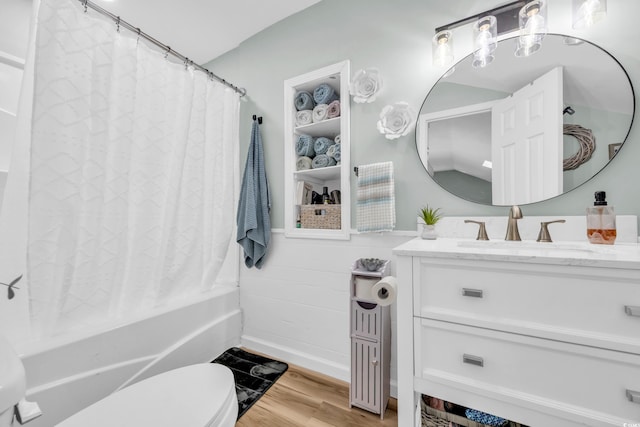 1014 Thomas Ave, North Myrtle Beach, SC 29582 - bathroom with wood finished floors, vanity, toilet, shower / bathtub combination with curtain, and baseboards