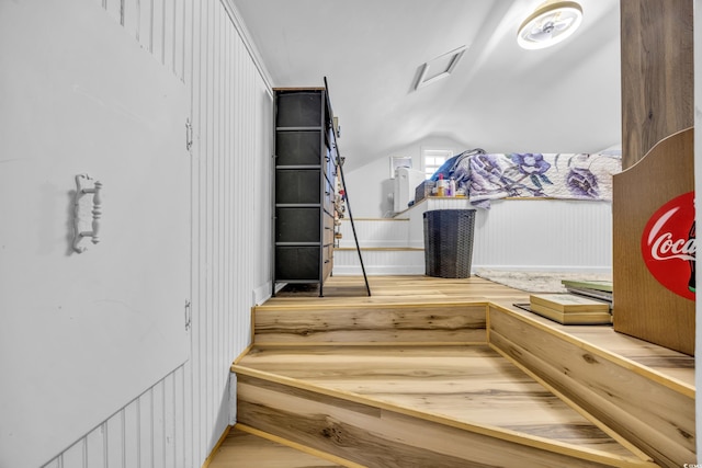 1014 Thomas Ave, North Myrtle Beach, SC 29582 - stairs featuring vaulted ceiling and wood finished floors