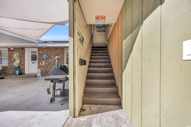 1014 Thomas Ave, North Myrtle Beach, SC 29582 - staircase with a wood stove