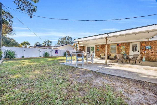 1014 Thomas Ave, North Myrtle Beach, SC 29582 - view of yard featuring a patio