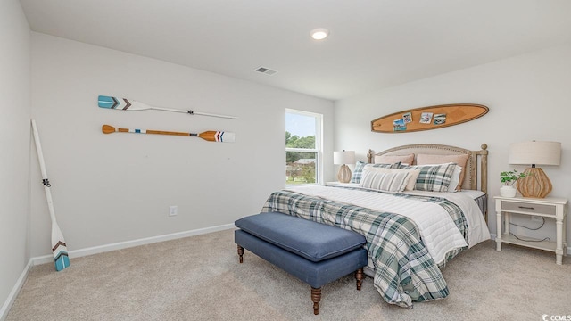 carpeted bedroom with baseboards and recessed lighting