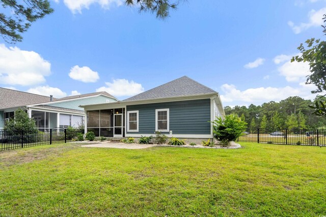 2909 Moss Bridge Ln, Myrtle Beach, SC 29579 - back of house with a sunroom and a patio area