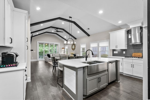 2909 Moss Bridge Ln, Myrtle Beach, SC 29579 - kitchen with a sink, open floor plan, light countertops, vaulted ceiling, and stainless steel appliances