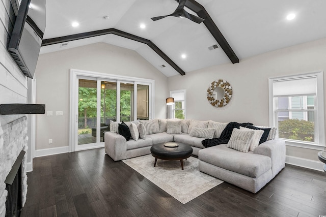 2909 Moss Bridge Ln, Myrtle Beach, SC 29579 - living area featuring a stone fireplace, healthy amount of natural light, ceiling fan, lofted ceiling, and dark wood-type flooring