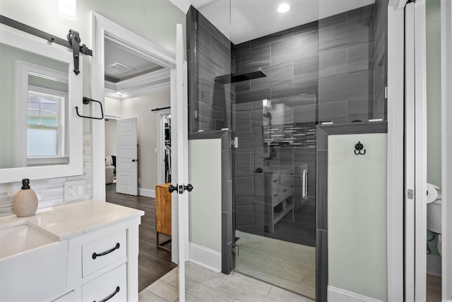 2909 Moss Bridge Ln, Myrtle Beach, SC 29579 - full bathroom with a shower stall, vanity, baseboards, toilet, and crown molding