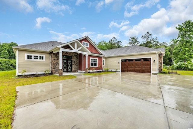 3995 Tillmond Dr, Conway, SC 29526 - craftsman inspired home featuring concrete driveway, stone siding, a garage, a shingled roof, and a front yard