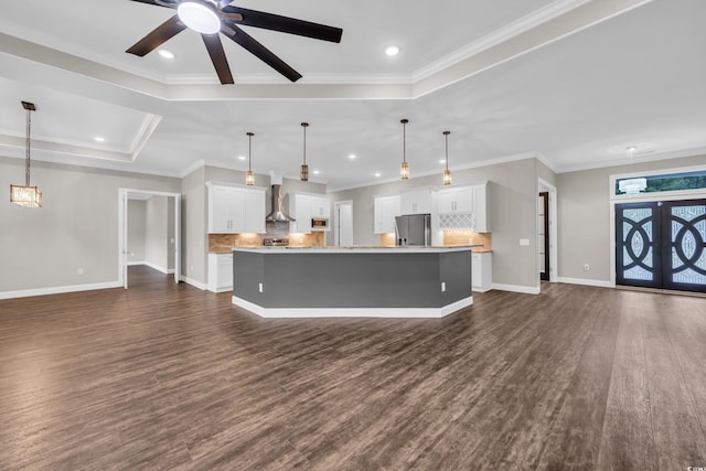 3995 Tillmond Dr, Conway, SC 29526 - unfurnished living room featuring baseboards, dark wood-type flooring, a ceiling fan, ornamental molding, and recessed lighting