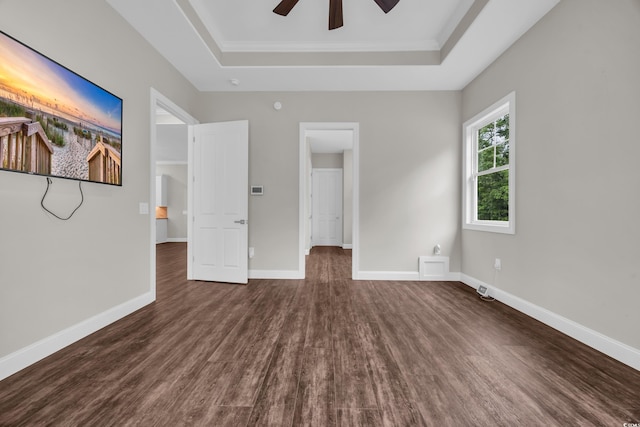 3995 Tillmond Dr, Conway, SC 29526 - unfurnished bedroom with a raised ceiling, dark wood-style flooring, baseboards, a ceiling fan, and ornamental molding
