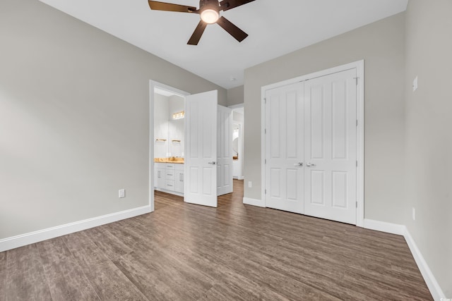 3995 Tillmond Dr, Conway, SC 29526 - unfurnished bedroom with dark wood-type flooring, baseboards, and a closet