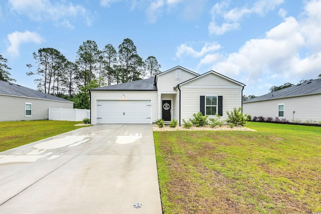 view of front of house with an attached garage, driveway, and board and batten siding