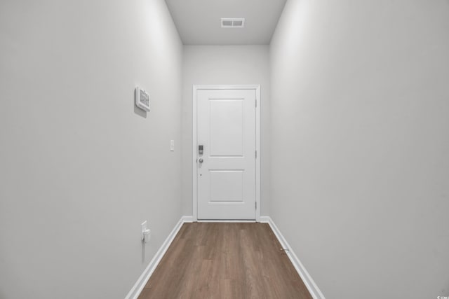112 Carolina Lakes Blvd, Myrtle Beach, SC 29588 - doorway with dark wood-style flooring and baseboards