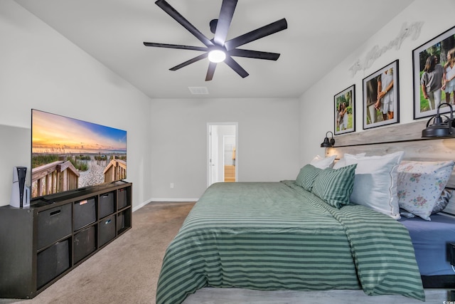 carpeted bedroom featuring ceiling fan and baseboards