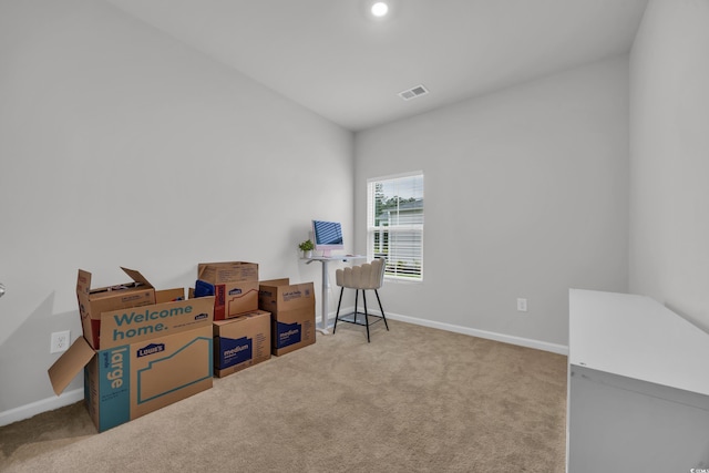 miscellaneous room featuring carpet and baseboards