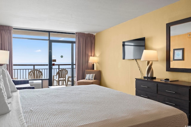 1501 S Ocean Blvd Unit 1231, Myrtle Beach, SC 29577 - bedroom featuring a water view and a wall of windows