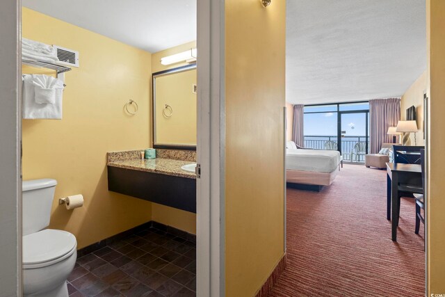1501 S Ocean Blvd Unit 1231, Myrtle Beach, SC 29577 - bathroom with toilet and baseboards