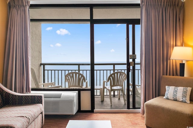 1501 S Ocean Blvd Unit 1231, Myrtle Beach, SC 29577 - sitting room with a water view, wood finished floors, floor to ceiling windows, and a wall unit AC