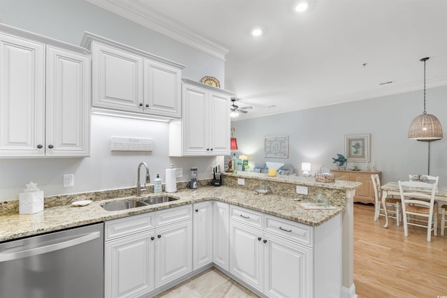 kitchen featuring stainless steel dishwasher, ornamental molding, a sink, a peninsula, and white cabinetry