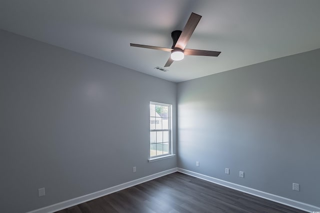 1031 Snowberry Dr, Longs, SC 29568 - spare room with dark wood-type flooring, baseboards, and a ceiling fan