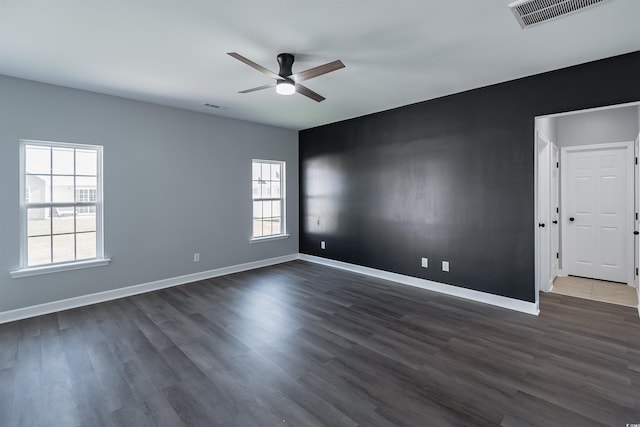1031 Snowberry Dr, Longs, SC 29568 - spare room with a ceiling fan, dark wood finished floors, and baseboards