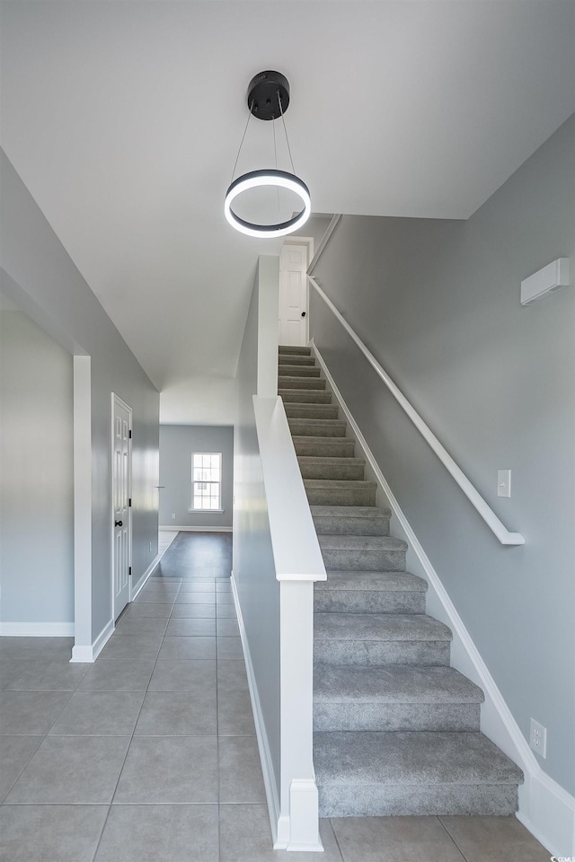 1031 Snowberry Dr, Longs, SC 29568 - staircase with baseboards and tile patterned flooring