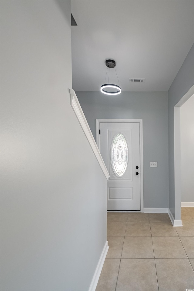 1031 Snowberry Dr, Longs, SC 29568 - foyer with light tile patterned floors and baseboards