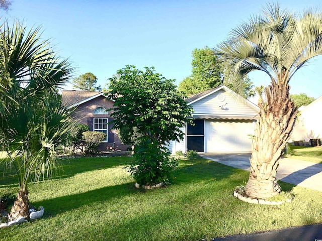 131 Goodale Dr, Longs, SC 29568 - view of front facade with concrete driveway, a front lawn, and a garage