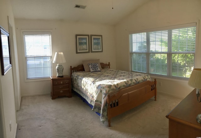 131 Goodale Dr, Longs, SC 29568 - bedroom featuring light carpet, multiple windows, lofted ceiling, and baseboards