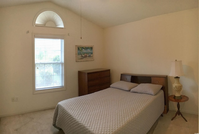 131 Goodale Dr, Longs, SC 29568 - bedroom with carpet flooring, multiple windows, baseboards, and vaulted ceiling