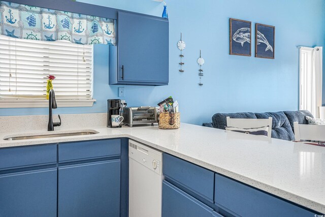 3700 Golf Colony Ln Unit 6J, Little River, SC 29566 - kitchen featuring blue cabinetry, white dishwasher, a sink, and open floor plan