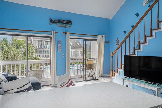 3700 Golf Colony Ln Unit 6J, Little River, SC 29566 - living room with plenty of natural light and stairs