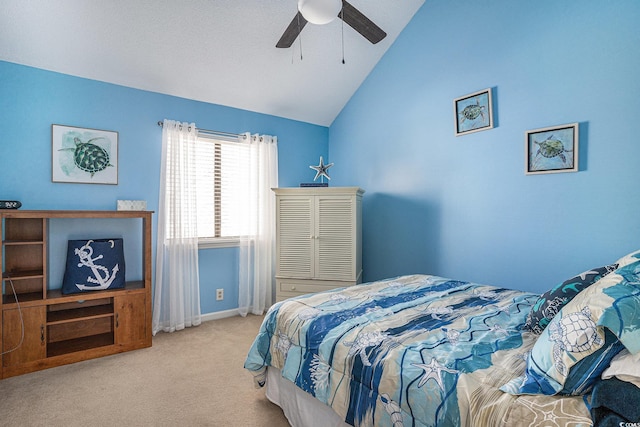 bedroom featuring carpet flooring, lofted ceiling, a ceiling fan, and baseboards
