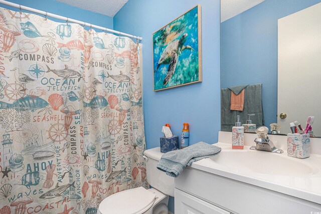 3700 Golf Colony Ln Unit 6J, Little River, SC 29566 - bathroom with toilet, vanity, and curtained shower
