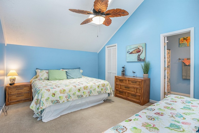carpeted bedroom with lofted ceiling, a closet, and ceiling fan