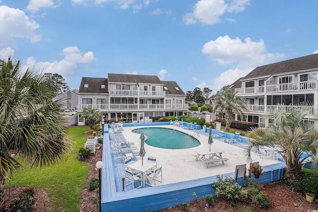 community pool featuring a patio