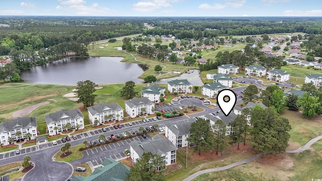 aerial overview of property's location with a nearby body of water and a local golf course